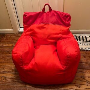 Big Joe Dorm Bean Bag Chair, two tone red and has pocket on right side.